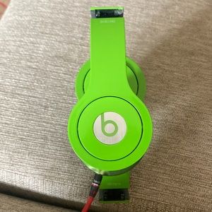 Beats by Dre like green headphone